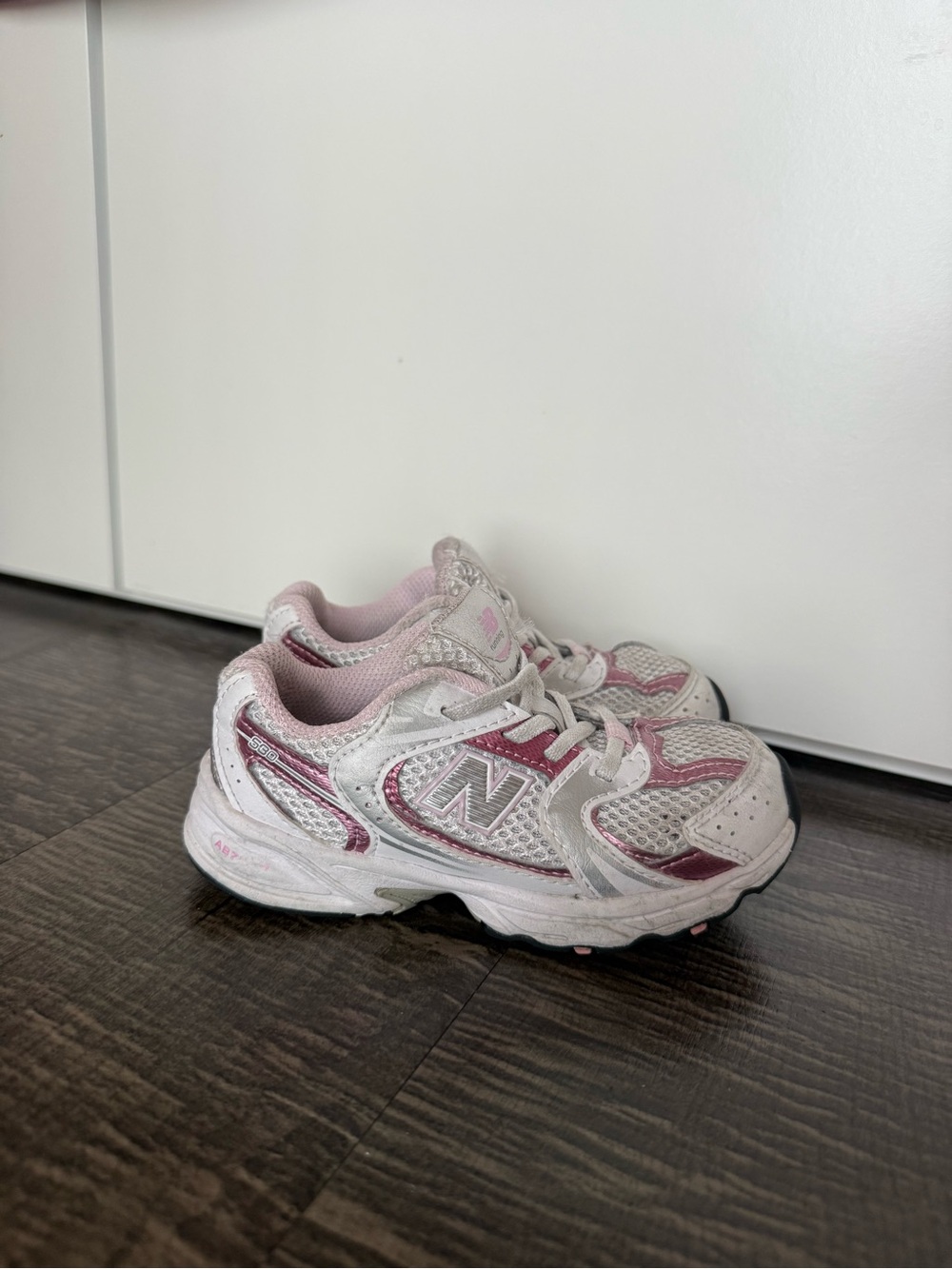 New Balance Kids White and Light Pink Athletic Sneakers